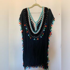 Black swim coverup with colorful Pom poms.